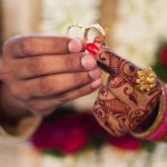 The holding of rings visually represents commitment, readiness, and intentional union — perfect for a blog on emotional readiness for a 2nd marriage