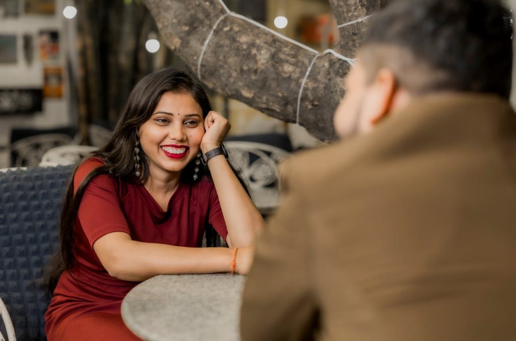 Indian man and woman having a calm and supportive conversation about remarriage and financial decisions