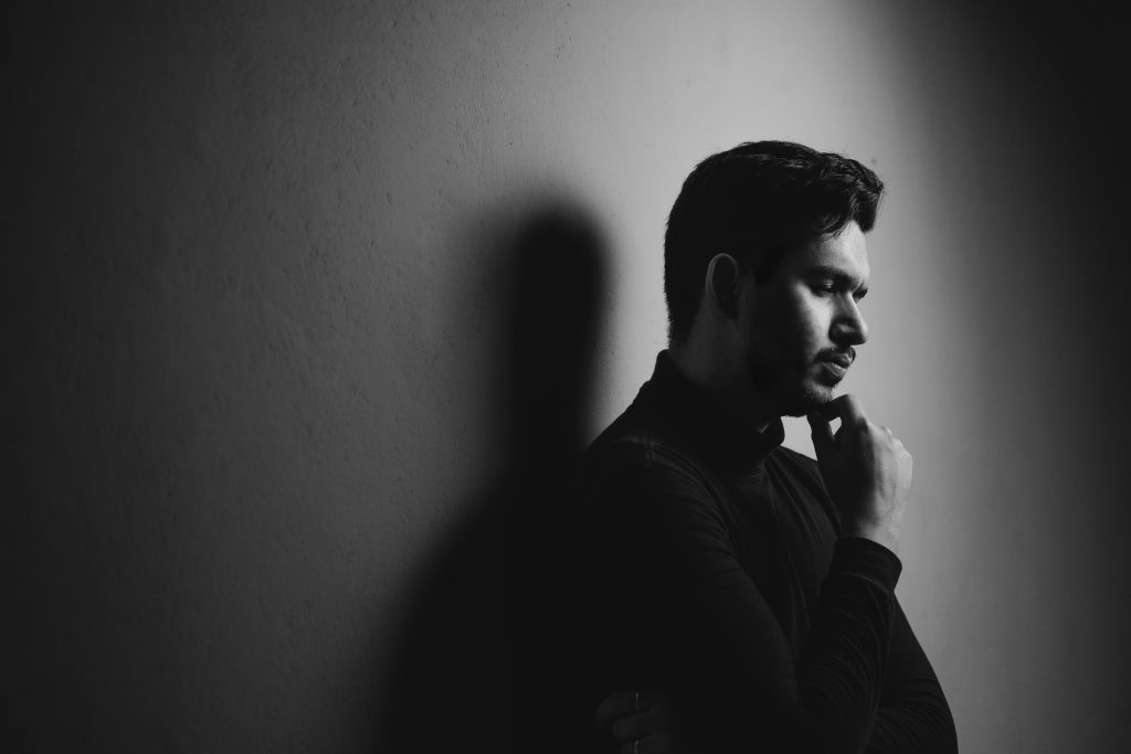 sad man thinking after divorce facing trust issues after divorce